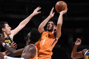  太阳加时险胜掘金登顶西部  